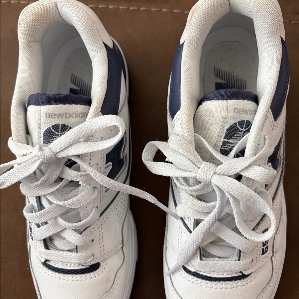 New Balance women’s White and Navy Sneakers